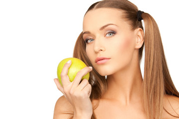 young beautiful woman with green apple