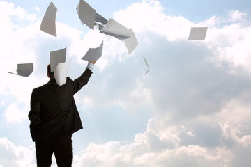 The businessman throws a pile of documents upwards, for a back - 25805498