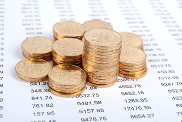 Fototapeta premium coins on financial data