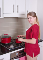 teenager cooking in the kitchen