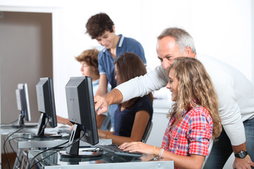 Teenagers in computing class