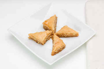 Baklava on white plate