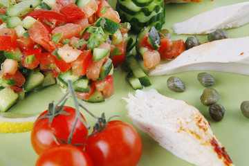 grilled meat drumstick served green