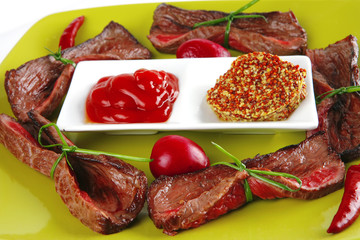 meat slices on green