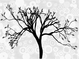 Obraz premium Creepy silhouetted tree surrounded by gray circle abstract sky