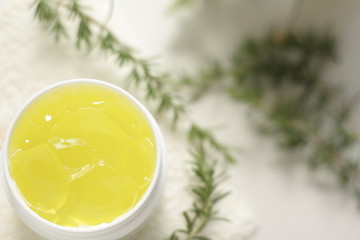 Moisturzine and towel with rosemary