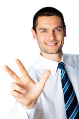 Happy businessman showing three fingers, isolated on white