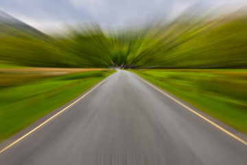 Road in a beautiful ladscape in Lake District, United Kingdom. S