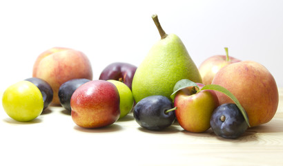 Fototapeta na wymiar Fresh fruits on white background