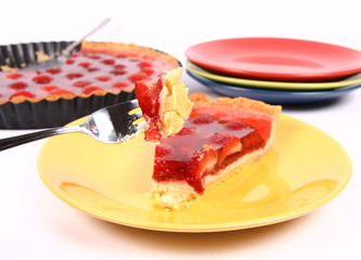 Piece of Strawberry Tart being eaten with a fork