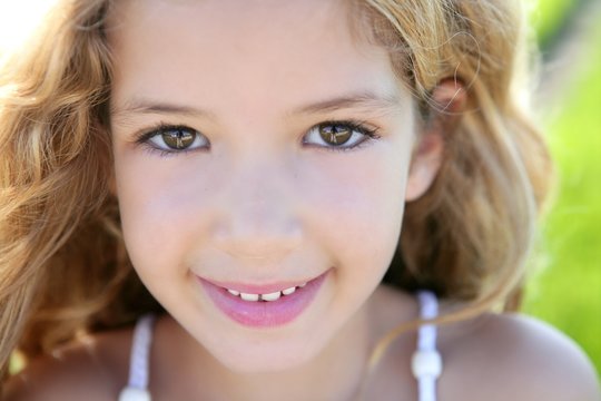 beautiful little girl portrait smiling closeup