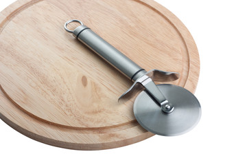 Pizza knife on a wooden cutting board