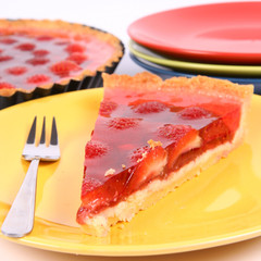 Piece of Strawberry Tart on a yellow plate