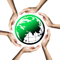 Green planet (Earth) surrounded by hands