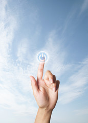 The hand presses the button turn on