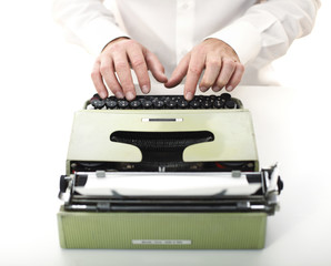 detail of man with typewriter