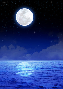 Stock image of the moon over the ocean
