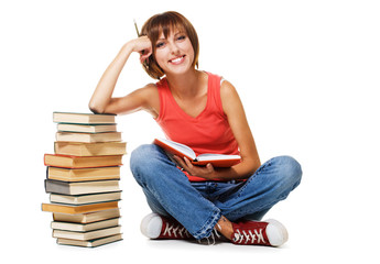 Lovely student with a stack of books