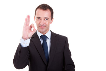 handsome businessman with thumb raised as a sign of ok