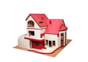 An isolated cottage mock up (scale model) on a white background