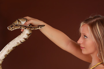 woman holding a snake