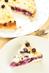 Slice of black currant pie