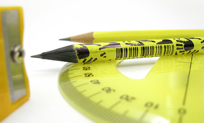 Yellow pencils,ruler and eraser