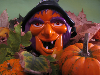 Naklejka premium Halloween witch and pumpkins-Halloween concept