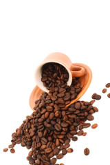 cup and coffee beans isolated over white background