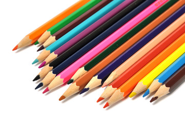 Assortment of colored pencils over white