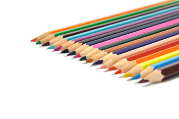 Assortment of colored pencils over white