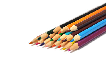 Assortment of colored pencils over white