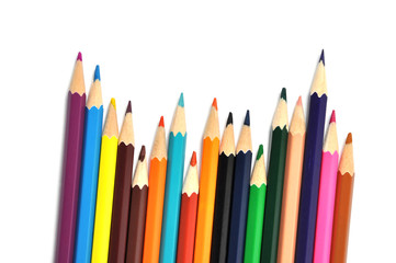 Assortment of colored pencils over white