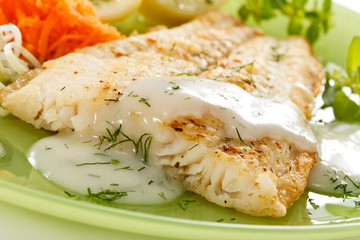 Fish dish - fried fish fillet with vegetables