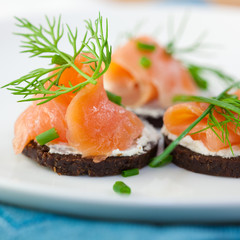 Canapes with smoked salmon and herbs