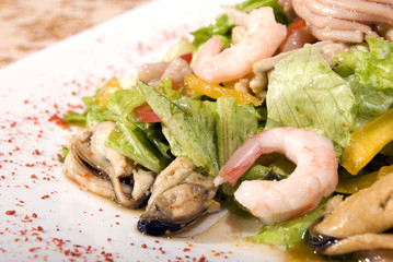 Salad made of different seafood and vegetables