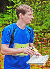sportsman on start of orienteering  competitions