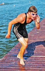 The sportsman has jumped out of water and runs