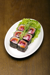 Portion of rolls served on the oval plate