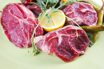 fresh beef medallion on green