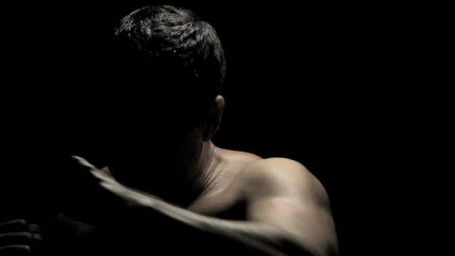 Boxer Sparring in Shadows in Slow Motion (medium)