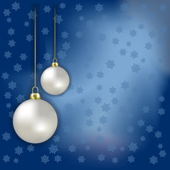 Fototapeta na wymiar Christmas balls and snowflakes on a blue background