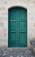 Fototapeta na wymiar Wooden green door.