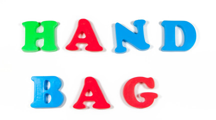 hand bag written in fridge magnets