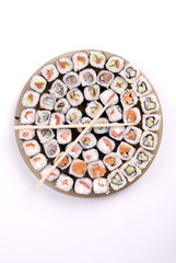 collection of different rolls served on the round plate
