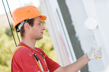 builder facade painter at work
