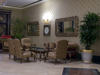 Sofa and armchair in a hall