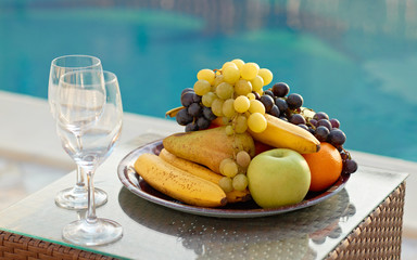 Fruits and wine glasses