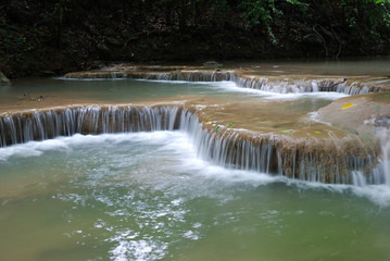 Fototapeta na wymiar Waterfall Erawan, in Kanchanabury, Thailand