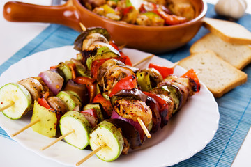 Grilled chicken meat and vegetable skewer